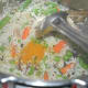 Step six: Throw in turmeric powder. Mix well.
