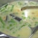 Step eight: Add water as per instructions. Mix well. Boil the mix for 3 minutes. Cover the cooker lid. Place the weight. Cook till one whistle and simmer for 2 minutes. Next, turn off the heat.
