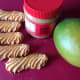 Some of the ingredients: biscuits, peanut butter, and a ripe mango.