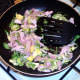 Bacon and sprouts are gently sauteed