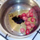 Starting to saute tomatoes in balsamic vinegar and olive oil
