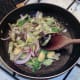 Frying sprouts and onion