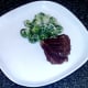 Plated ox cheeks and sprouts in blue cheese