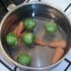 Sprouts are added to simmering carrots