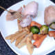 Tucking in to chicken thighs with roasted sprouts and carrots