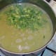 Leftover ham and celery leaves are added to soup
