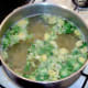 Shredded sprouts are added to partly cooked pasta