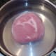 Ham is placed in a large pot of cold water
