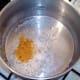 Turmeric and salt are added to rice