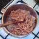 Chicken and celtuce pasta ingredients are stirred together