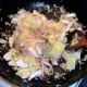 Light soy sauce is added to stir frying rice