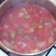 Cooked soup is left to cool before being blended