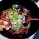 Celtuce leaves are added to the stir fry at the very last minute