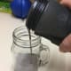 Pour the smoothie into a glass.