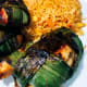 The chicken is ready. Take out the leaves and serve with your favorite rice.