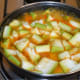 Step three: Boil the mix. Lower the heat. Cover and cook for about 5 minutes.