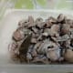 Drain the excess water; then marinate the gizzards in an olive oil, salt, and pepper