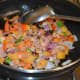 Stir-cook till tomatoes become a bit mushy.