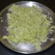 Step one: Grate bottle gourd. Squeeze and remove some water from it. Collect the water.