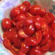 Cut cherry or grape tomatoes in half