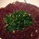 Pho noodles in skillet with kale and garlic