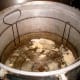 This is what happens if you put vinegar in the water to keep mineral sediment from building up on the jars and canner. Don't add vinegar when processing milk! It curdles the milk, and causes it to cling to the jars in an obnoxious goo.