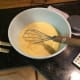 Step 2 Continued: Bring 3 cups of heavy cream to just below a boil in another saucepan, then pour the cream in, mix.