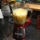 Step 3: Place the fruit and its juice into a blender or whatever blending device is available, add in the 1 cup shredded coconut, and blend to a fine purée