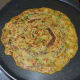 Make both the sides golden brown. In the same way, make more pancakes.