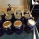 With your jar lifter, carefully place each jar into your pressure canner.