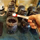 Add in 1/2 teaspoon of salt to each jar.