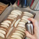 Spray your potato slices with coconut oil or your preferred cooking oil.