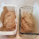 Pour out your dough and mix one more time on the counter. Then separate the dough into two pieces and put those into your loaf pans.