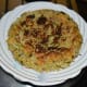 Once done, remove the handvo carefully, and place it on a plate.