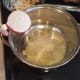 In the large pot, add your flour.