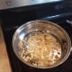 In the small pan, chop your onion and cook over medium until translucent, both over medium heat.