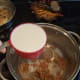 Then add your milk and whisk to get rid of any clumps.