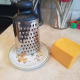 Grate your cheese.