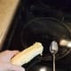 Fish out your corn cobs and scrape them down with a spoon or knife into your pot to get all of the leftover kernels and milk from your cobs.