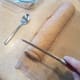 Now cut your cinnamon roll log into 1/2 inch to 1 inch slices.