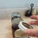 Twist a ring onto each jar, but only until you feel the slightest resistance.