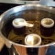 Fill your canner with water to a couple inches above your jars.