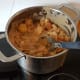 Chicken stew in a pot. Now the only thing left is to mix it and let it heat up.