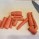 Chop several carrots.