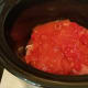 And then spread the tomato paste over the top for a little more liquidy tomato flavor.