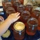 Add a lid to each jar.