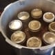 Load all of your jars in your canner, lock the top in place and follow the more detailed directions in the recipe above.