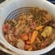 What you do with your leftover veggie scraps is up to you. They can be used in your garden, fed to chickens, put in a compost pile or just thrown away. Be aware that dogs cannot have garlic or onions.