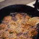 Step 5: Drop pakora batter into hot oil