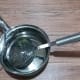 A pot, cooking spoon, and strainer are needed to cook the dish.